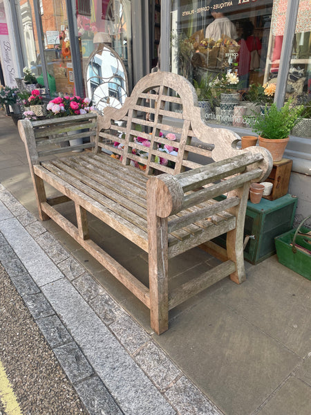 A Lutyen’s style garden bench right side view