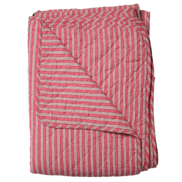 A folded quilted blanket with a pink and white vertical stripe pattern, shown against a plain white background.