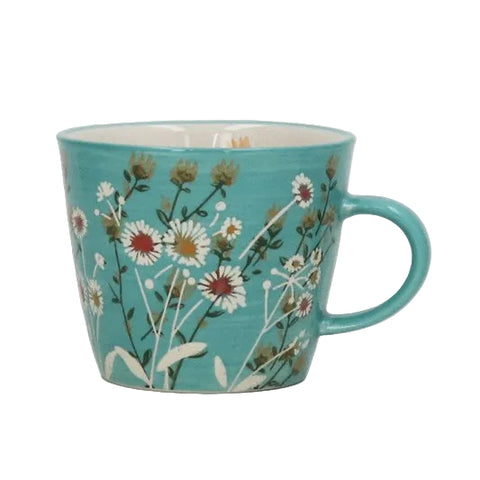 A turquoise ceramic mug decorated with a delicate daisy and wildflower pattern, featuring a matching handle and a white interior, set against a neutral light gray background.