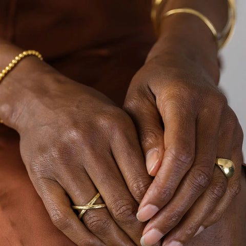 files/Amano_Studios_Cross_Over_Hammered_Ring_-_Gold_On_Model.webp