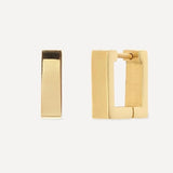 Gold hoop earrings on a white background
