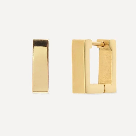 Gold hoop earrings on a white background