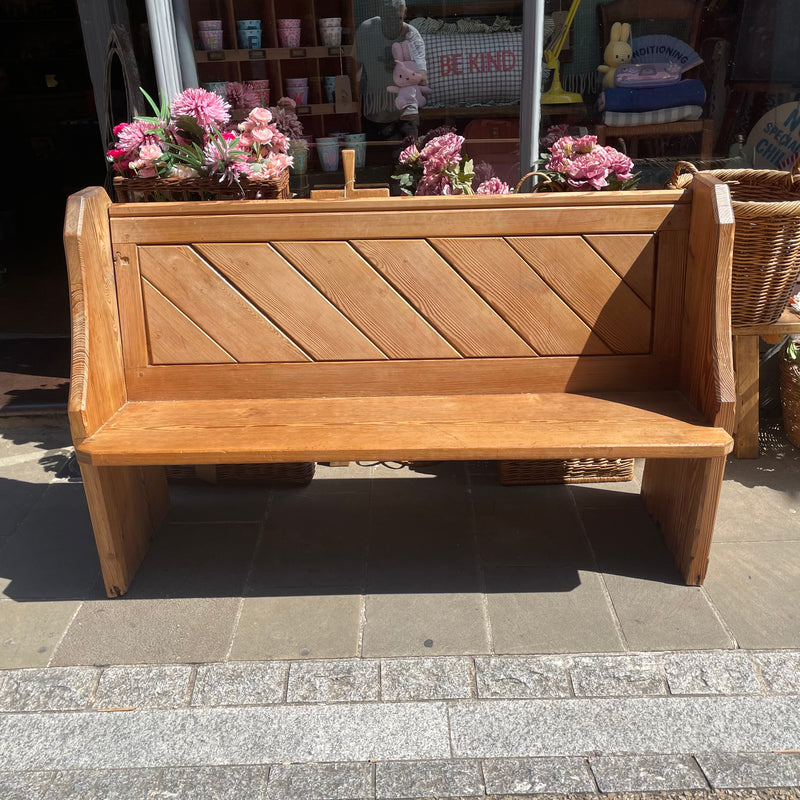 Antique pitch pine pew front view