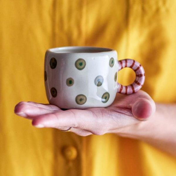 Bloomingville Nini Cup - Cream with Green Spots with hand