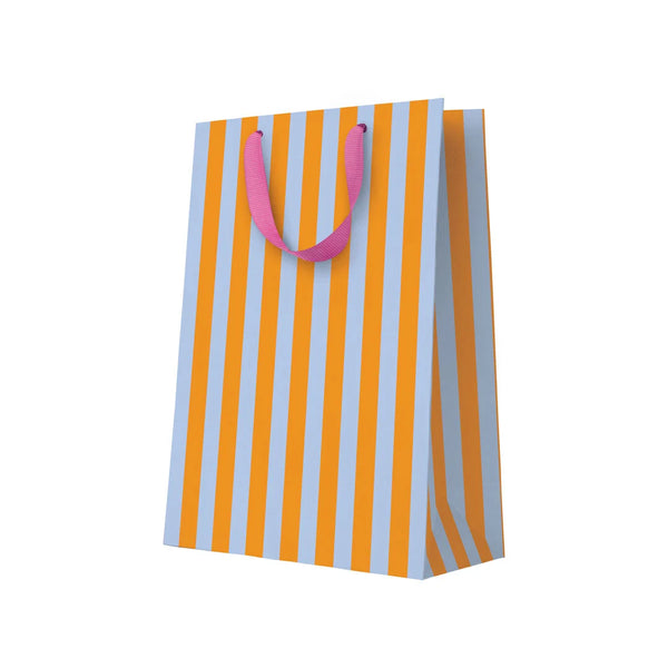 Striped paper bag with orange and blue vertical stripes and pink handles on a white background