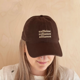 'Caffeine Reliance Alliance' Cotton Baseball Cap - Brown Model