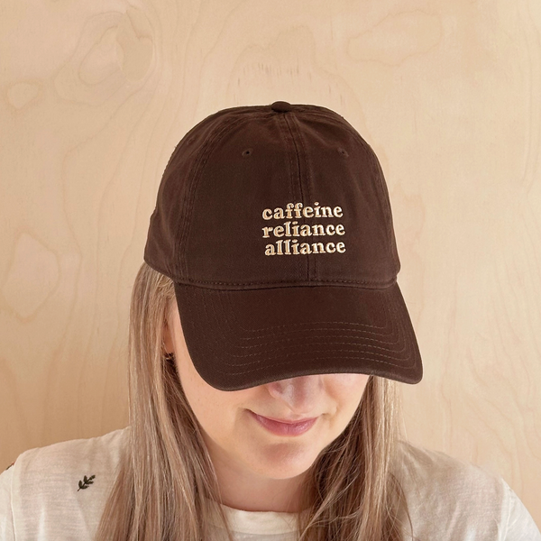 'Caffeine Reliance Alliance' Cotton Baseball Cap - Brown Model
