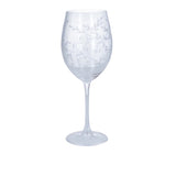 Clear wine glass with intricate designs