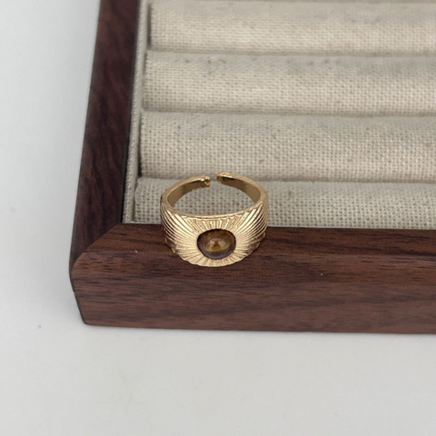 files/Consortium_-_Ridged_flare_natural_stone_ring_in_tigers_eye_gold..png