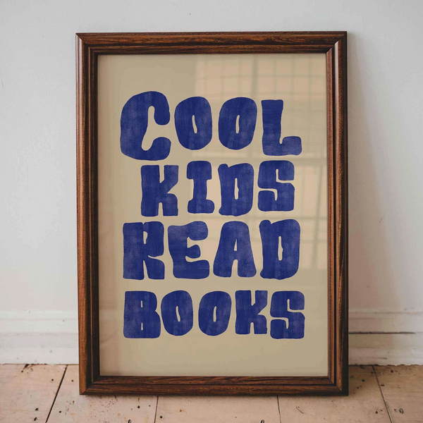 Dandy Prints ' cool kids read books' framed print in navy bubble writing and cream background 