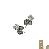 Pair of silver stud earrings with clear gemstones on a white background.