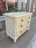 Distressed painted chest of drawers left side