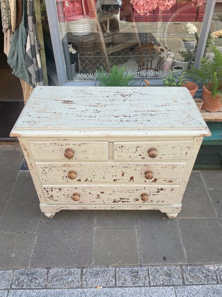 Distressed painted chest of drawers top view
