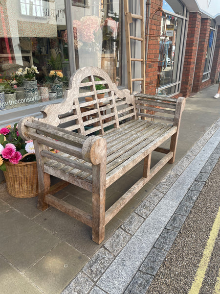 A Lutye’s style garden bench left side view