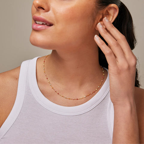 files/ENAMEL_Copenhagen_Lola_Rainbow_Necklace_-_Gold_-_wearing.webp