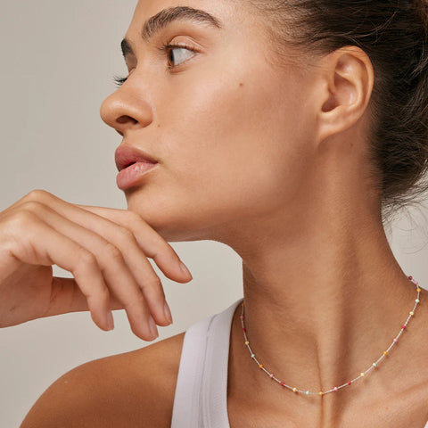 files/ENAMEL_Copenhagen_Lola_Rainbow_Necklace_-_Silver_-_wearing.webp