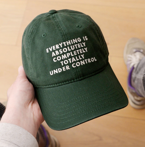 files/Everything_is_Absolutely_Completely_Totally_Under_Control_Cap_Side.png