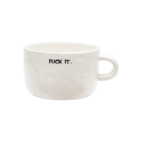 White mug with 'F**K IT.' text on a white background