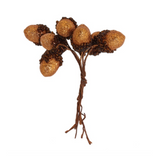Gisela Graham A decorative faux acorn cluster with five glittery gold acorns and dark brown textured caps and stems, shown on a plain white background.