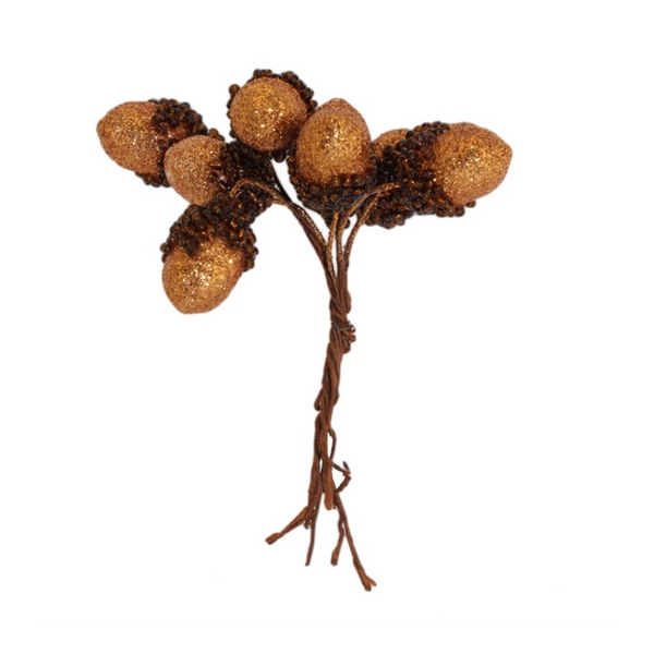 Gisela Graham A decorative faux acorn cluster with five glittery gold acorns and dark brown textured caps and stems, shown on a plain white background.