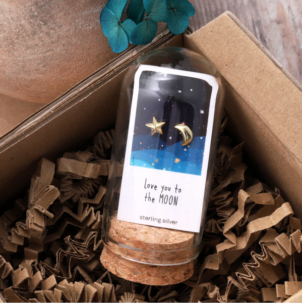 Gold sun and moon stud earrings 