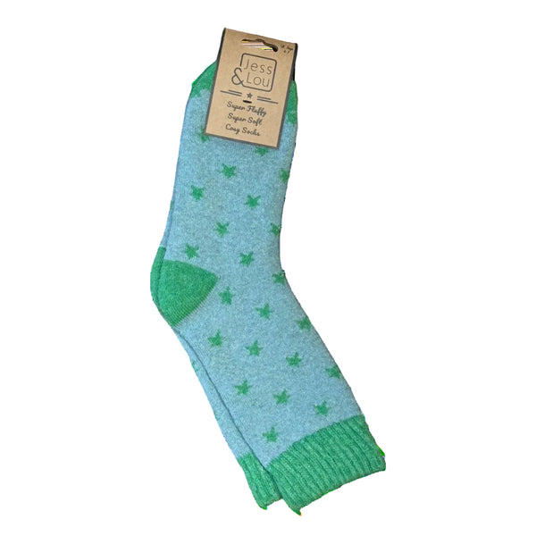 A pair of light blue and green socks with a star pattern, shown with a kraft paper hangtag on a white background.