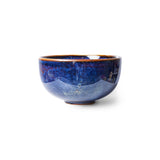 Blue ceramic bowl on a white background