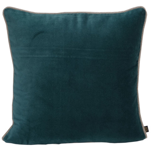 Blue velvet cushion on white background