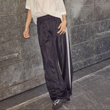 Haute L'Amitié Baggy Track Pants Black 