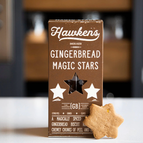 Box of Hawken's Gingerbread Magic Stars with a star-shaped cookie on a blurred background