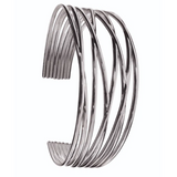 Silver bracelet with a twisted design on a white background