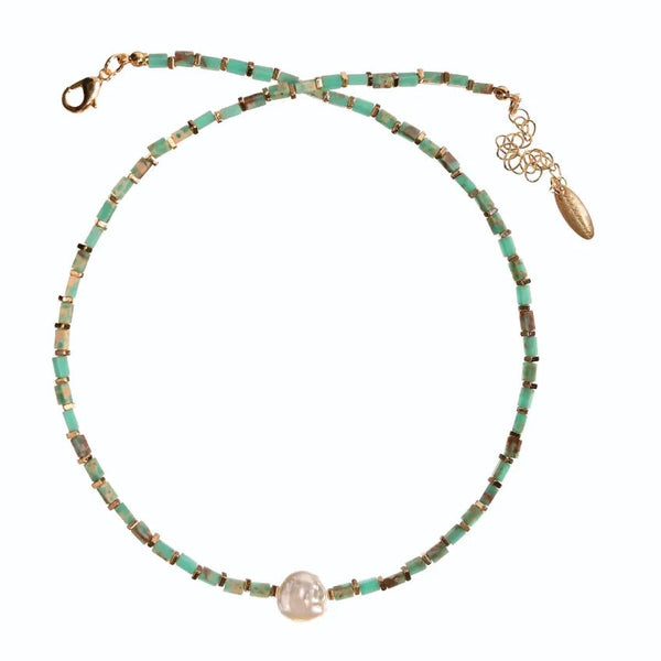 Necklace with turquoise beads and a pink pearl on a white background