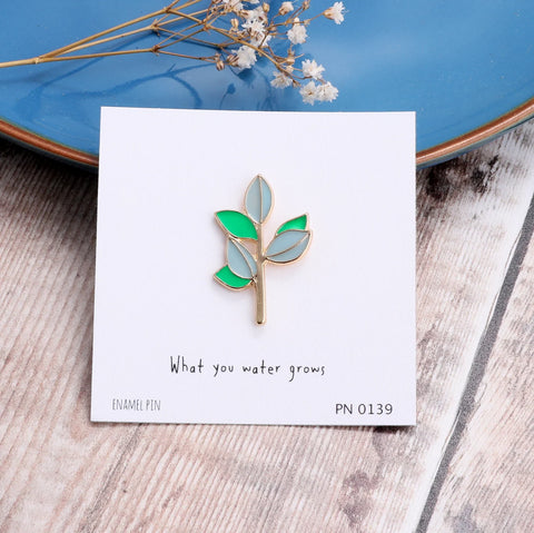 Attic Creations "What You Water Grows" Enamel Pin