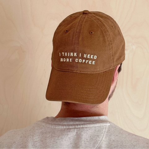 files/I_Think_I_Need_More_Coffee_Cotton_Baseball_Cap_-_Tan_Model.png