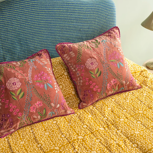 Ian Snow Dusty Rose Velvet Flower Embroidered Cushion on bed