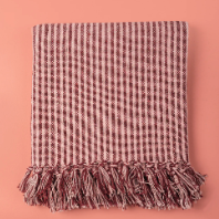 Ian Snow Plum & Dusty Rose Recycled Cotton Striped Throw folded