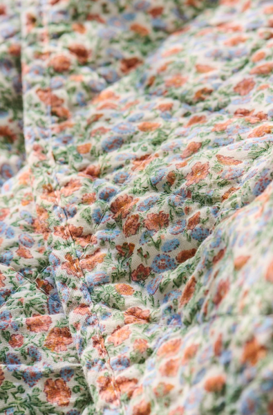 Ib Laursen Quilt w/light blue and rust flowers Close