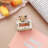 Mid Size Resin Claw Clip In Cream & Black Speckle
