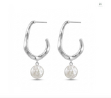A pair of silver-toned abstract hoop earrings with dangling textured white freshwater pearls, shown on a plain white background.