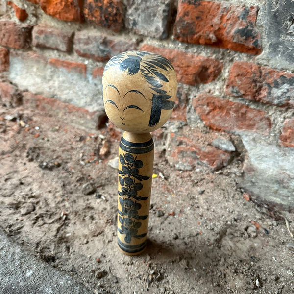 Japanese Kokeshi Dolls black side view