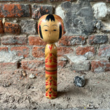 Japanese Vintage Kokeshi Red Pattern doll front view 