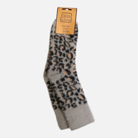 A single fuzzy ankle sock with an animal print pattern in gray, black, and beige, attached to a paper header card that reads 'Jess & Lou Animal Print Sock'.
