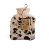 A plush faux-fur hot water bottle in an animal print pattern of beige, black, and cream, featuring a wooden hanger and a paper brand tag that reads 'Jess & Lou Animal Print Hot Water Bottle'.
