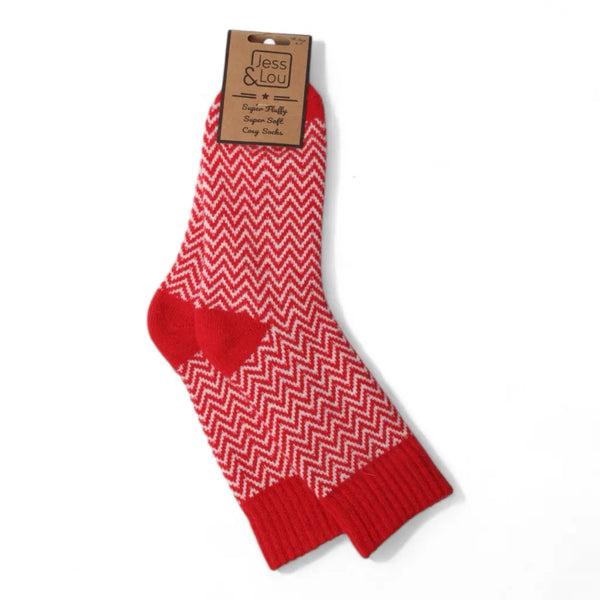 Red and white herringbone patterned sock with 'Jess & Lou' packaging on a white background