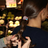 KKNEKKI Original Hair Tie - Turquoise & Coral Glitter on model