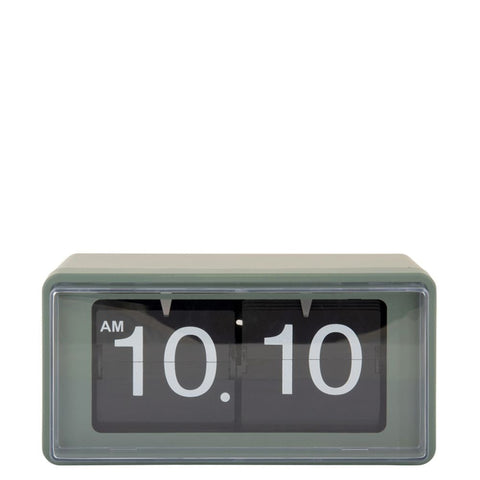 Digital clock with a black display on a white background