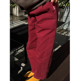 Le Bon Shoppe Arc pants in Oxblood side view with someone wearing them 
