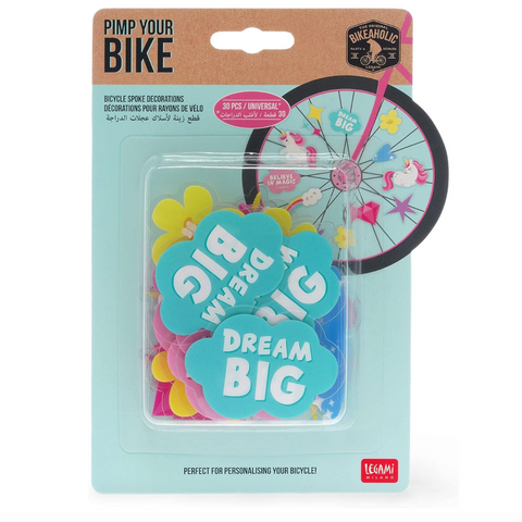 Packaged bicycle wheel decoration with 'Pimp Your Bike' branding and 'Dream Big' text.