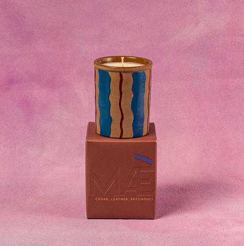 files/Maegan_Good_Candle_-_Red_Wave_-_Cedar_Patchouli.png