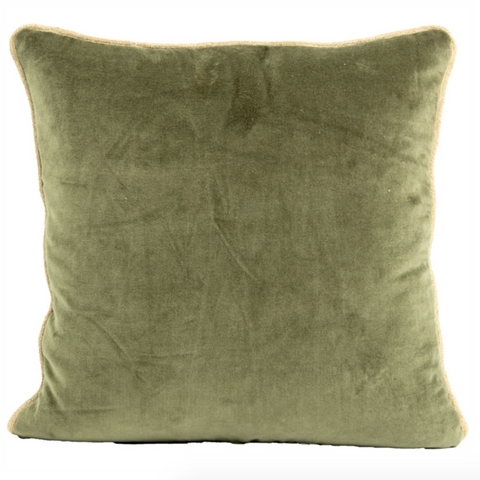 Green velvet pillow on a white background
